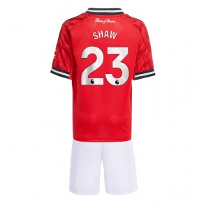 Manchester United Luke Shaw #23 Replika Hemmatröja Barn 2025-26 Kortärmad (+ Korta byxor)